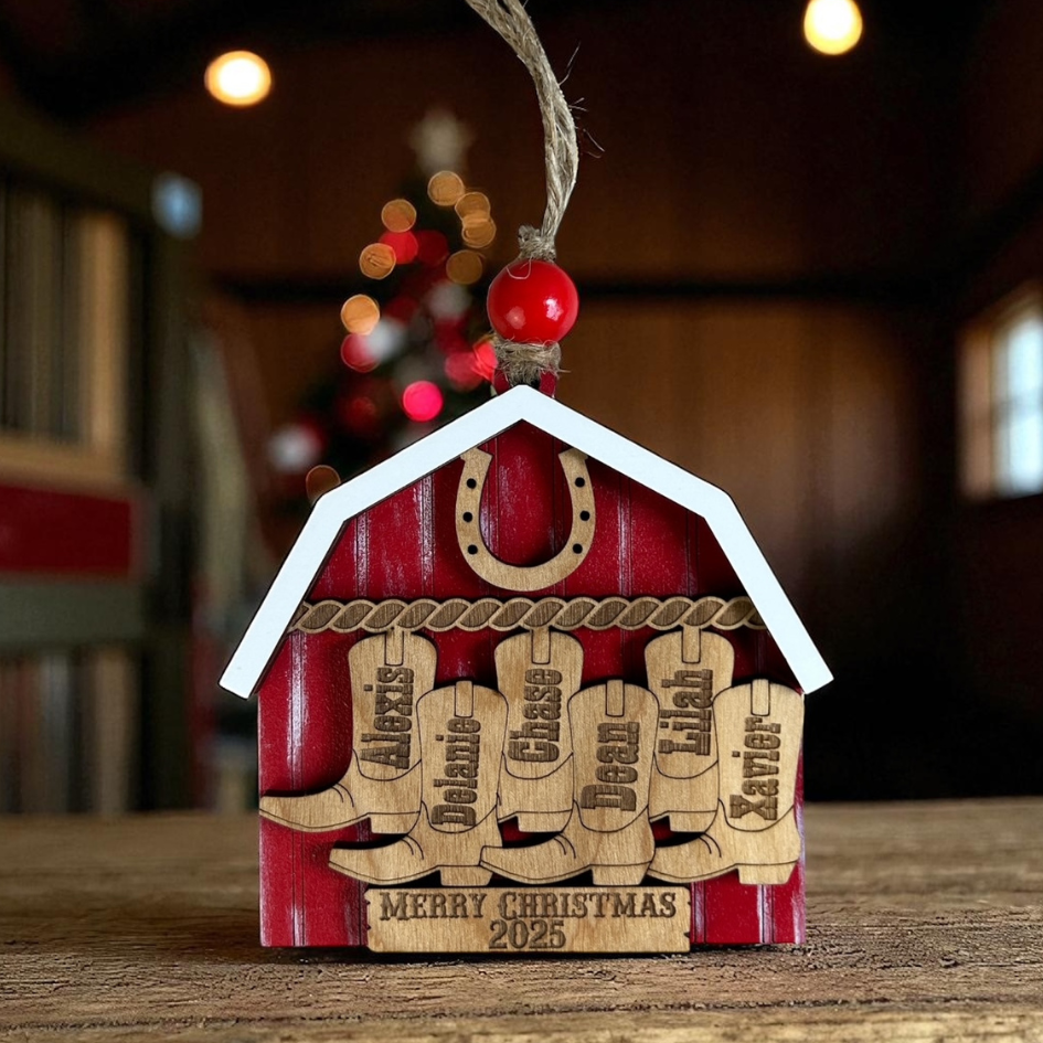 Wooden Christmas ornament shaped like a house with cowboy boot designs and 'Merry Christmas 2023' text.