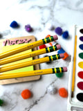 Personalized pencils with your child's name.